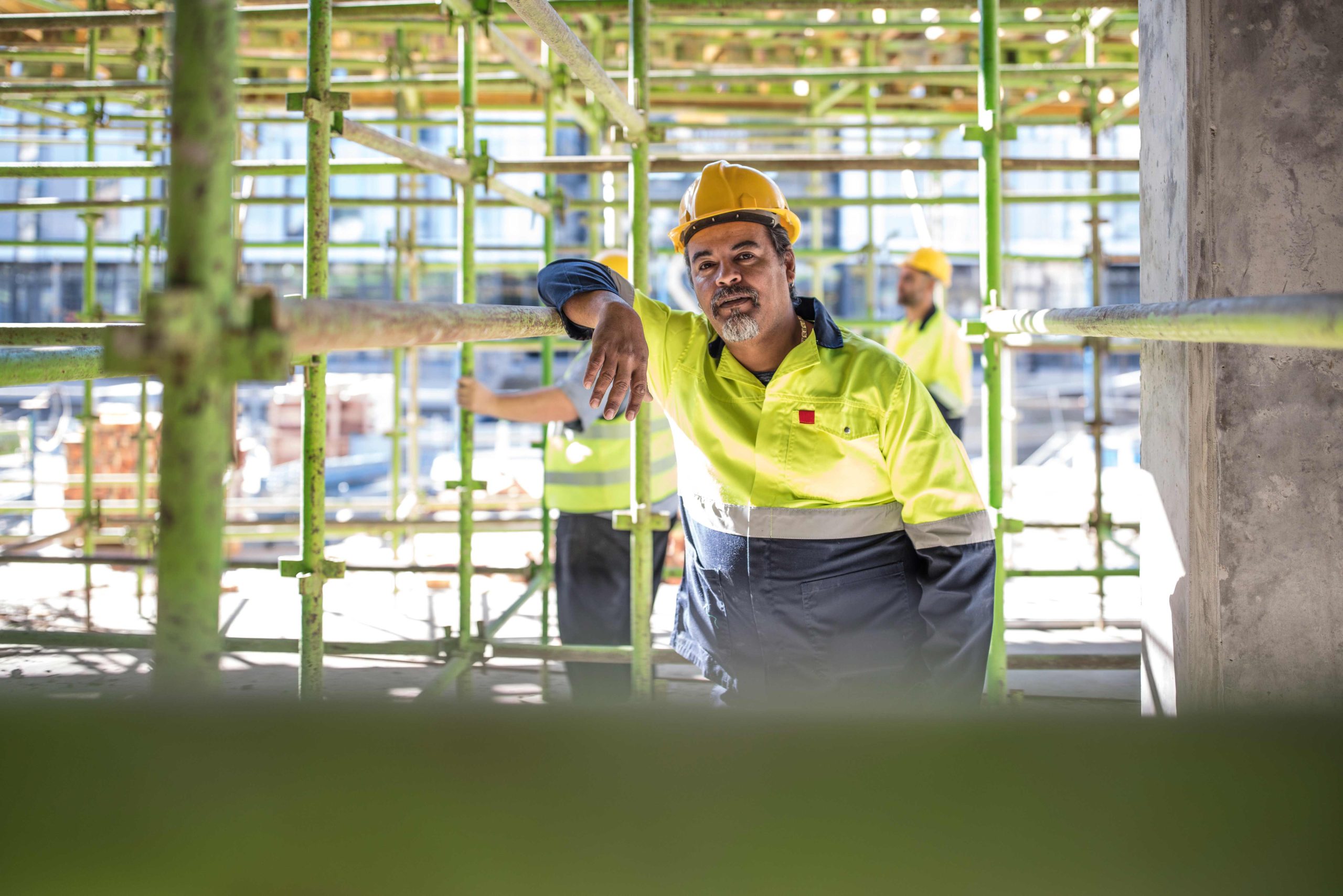 construction-workers-on-scaffolding-2024-06-25-21-14-09-utc