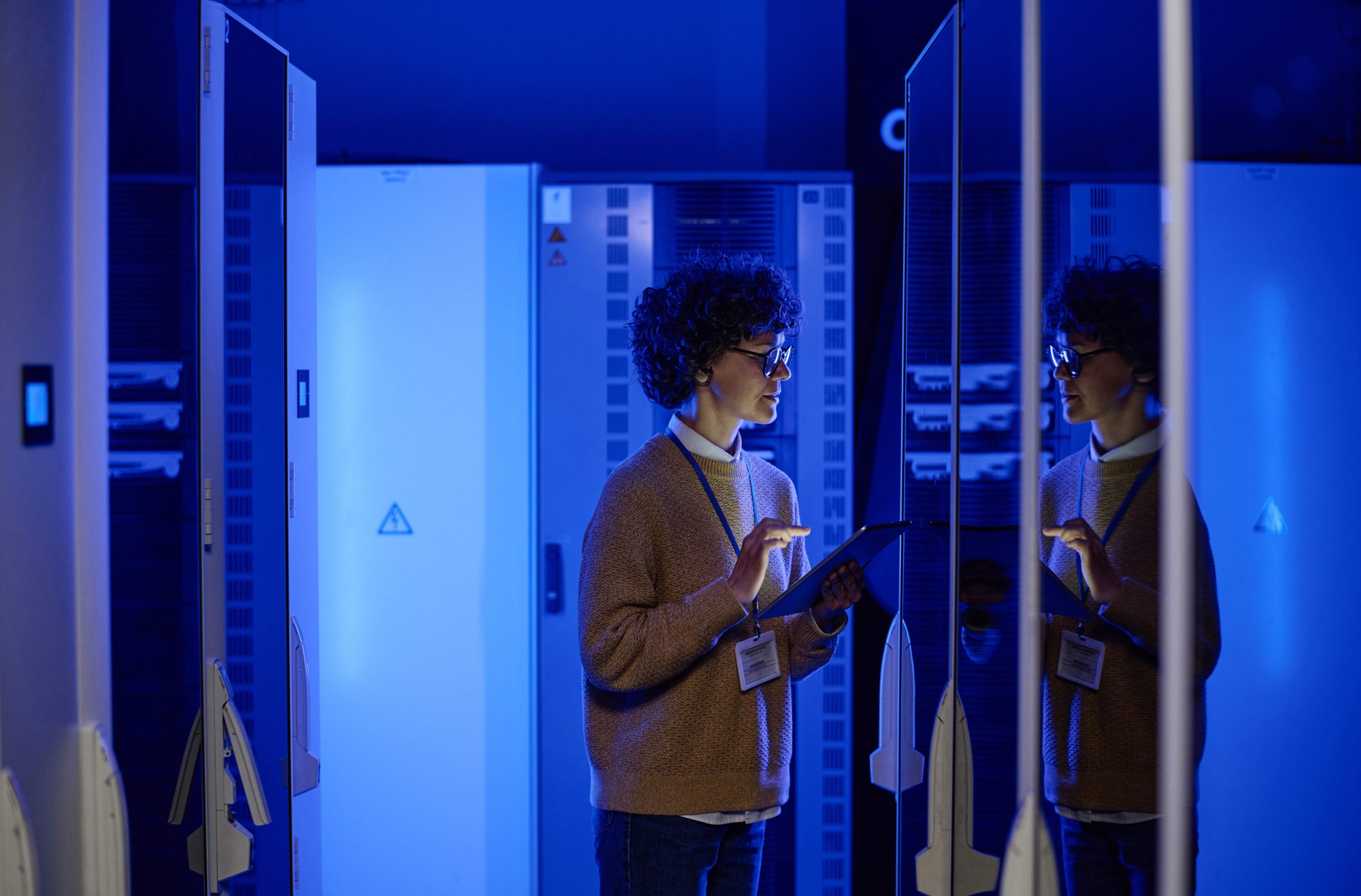 female-it-engineer-working-in-server-room-2023-11-27-05-09-35-utc