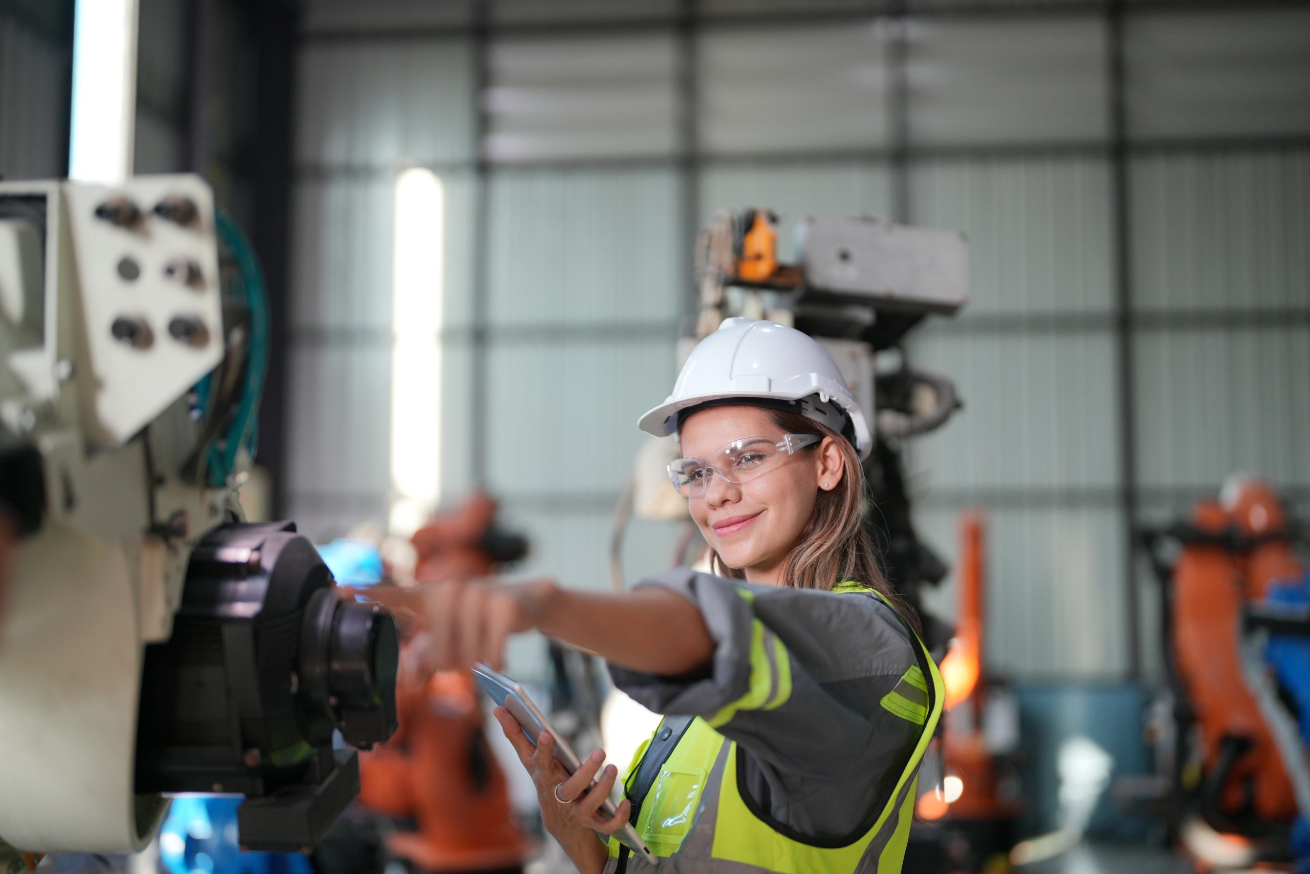 Tech industry. Business industry technology, people and tech. Engineer working in factory.